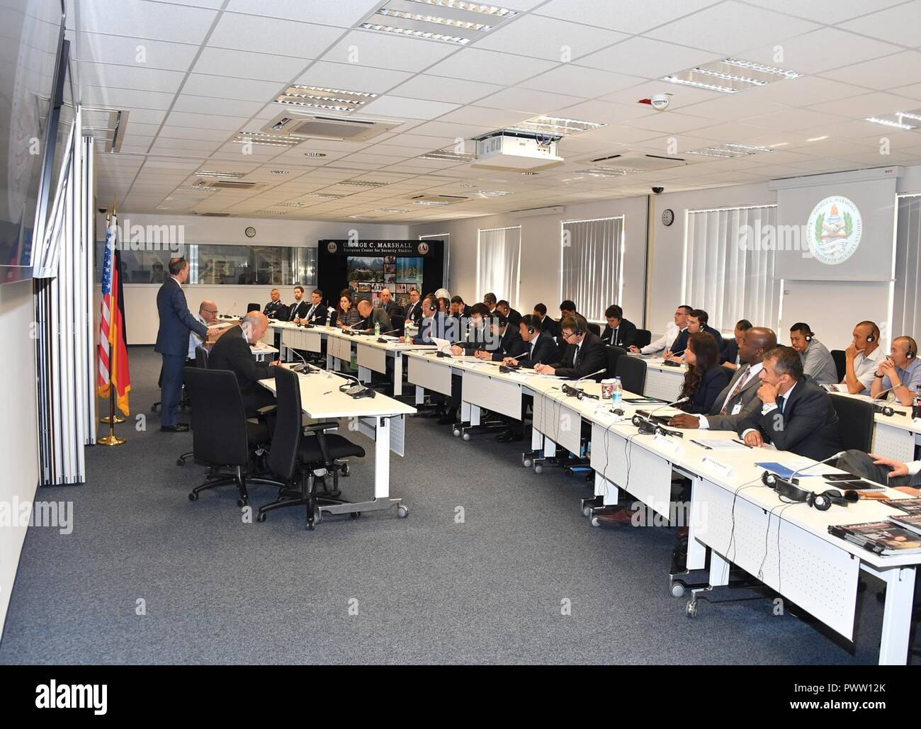 Ambassador Douglas Griffiths, associate director for International Liaison at the George C. Marshall European Center for Security Studies, welcomes 23 Central Asian government officials to the Central Asia Workshop on “Countering Transnational Organized Crime) June 19 at the Marshall Center. (Marshall Center Stock Photo