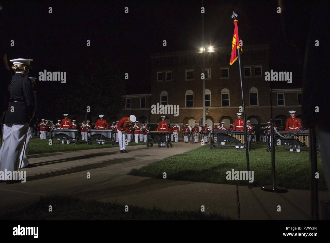 U.S. Marines with the U.S. Marine Drum and Bugle Corps perform during an evening parade at Marine Barracks Washington, Washington, D.C., June 9, 2017. Evening parades are held as a means of honoring senior officials, distinguished citizens and supporters of the Marine Corps. Stock Photo