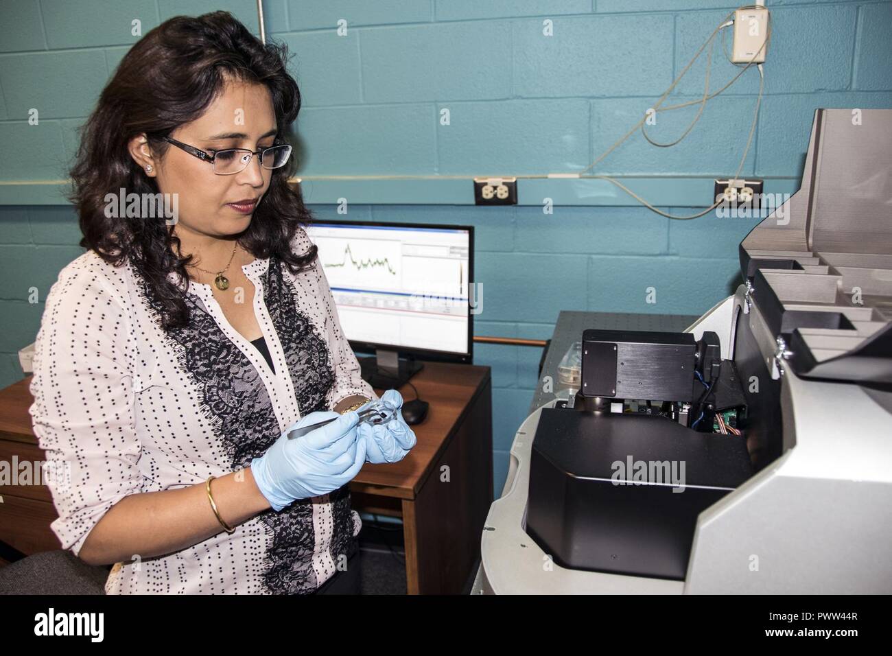 AFRL research materials engineer Dr. Dhriti Nepal of the AFRL ...