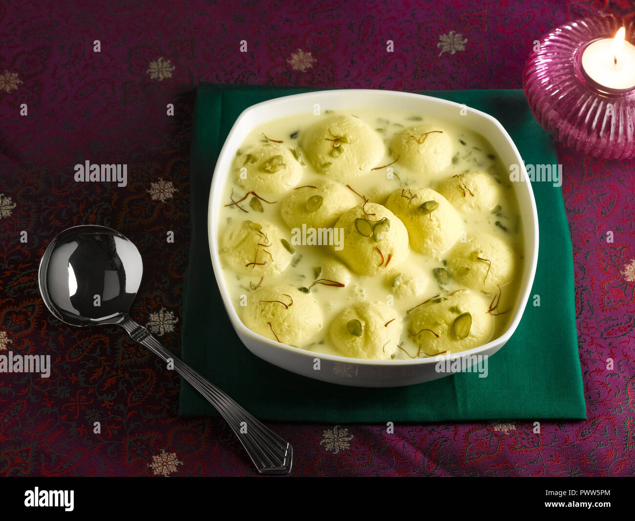 Rasmalai An Indian Dessert Made From Cottage Cheese Soaked In