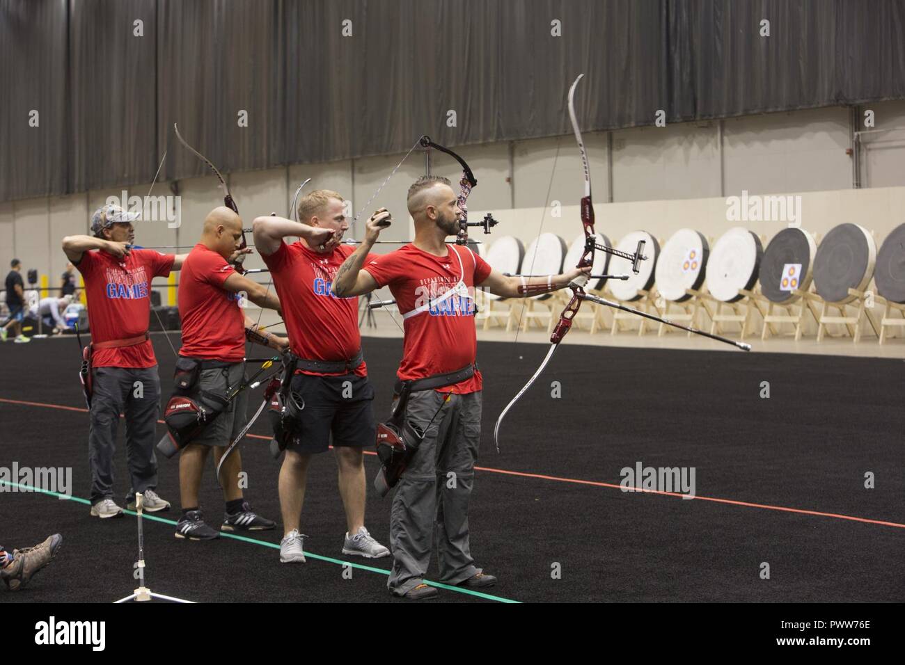 2017 DoD Warrior Games Team Marine Corps archers send arrows downrange during a Warrior Games practice at McCormick Place in Chicago, June 29, 2017. The Warrior Games is an adaptive sports competition for wounded, ill and injured service members and veterans. Stock Photo