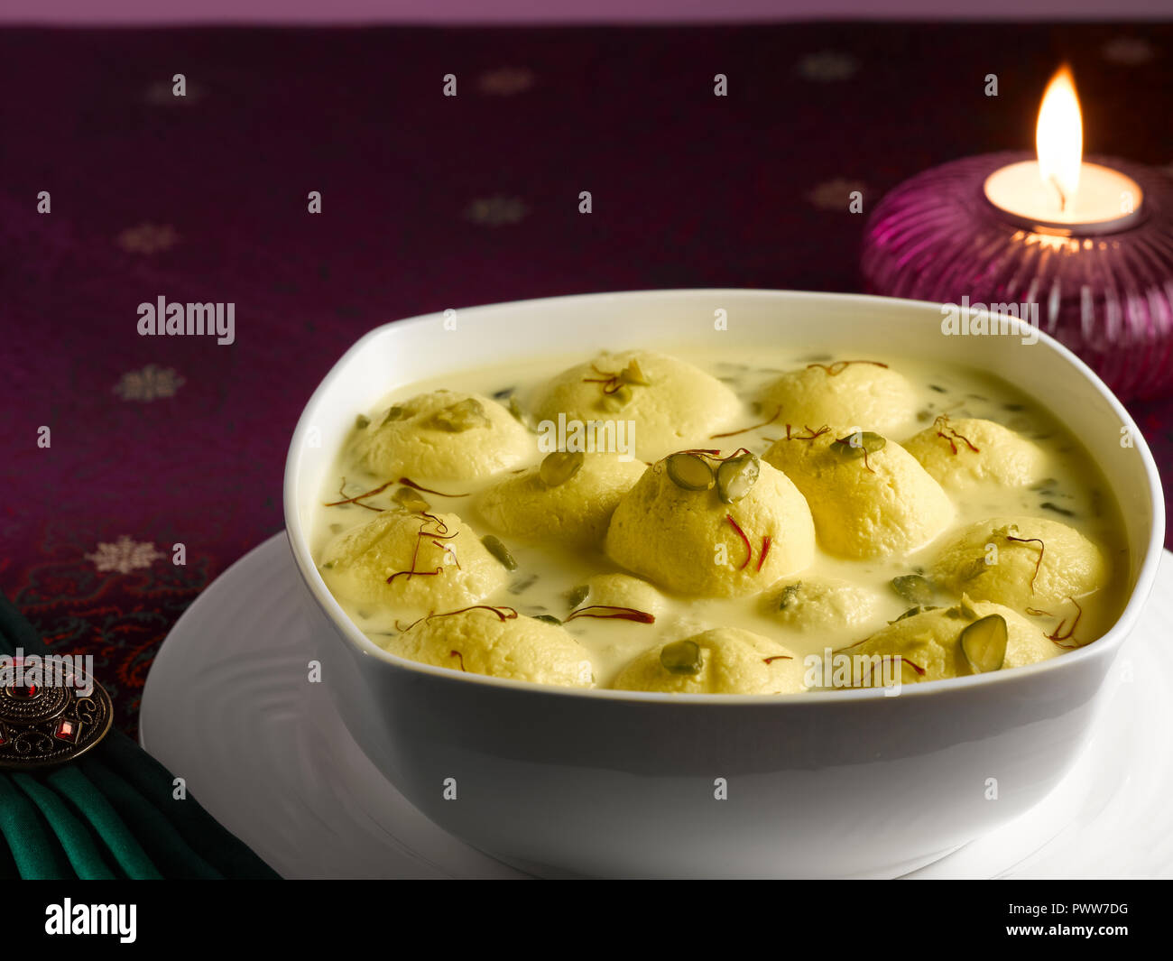 Rasmalai An Indian Dessert Made From Cottage Cheese Soaked In