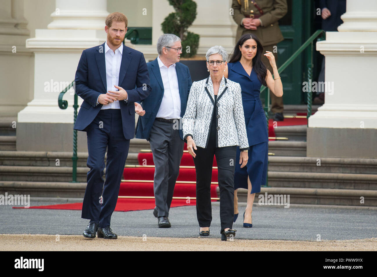 The Duke and Duchess of Sussex with Governor of Victoria Linda Dessau and her husband Anthony Howard at a reception given by the Governor of Victoria, at Government House during their visit to Melbourne, on the third day of the royal couple's visit to Australia. Stock Photo