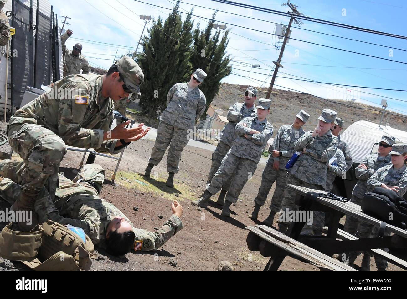 An Army medic provides first-responder casualty training to Airmen from the 178th Medical Group and 121st Medical Group during a joint medical training at the Pohakuloa Training Area, Hawaii. Thirty-three Airmen participated in the training, provided real-world medical assistance and completed their annual training requirements, June 11-23. Stock Photo