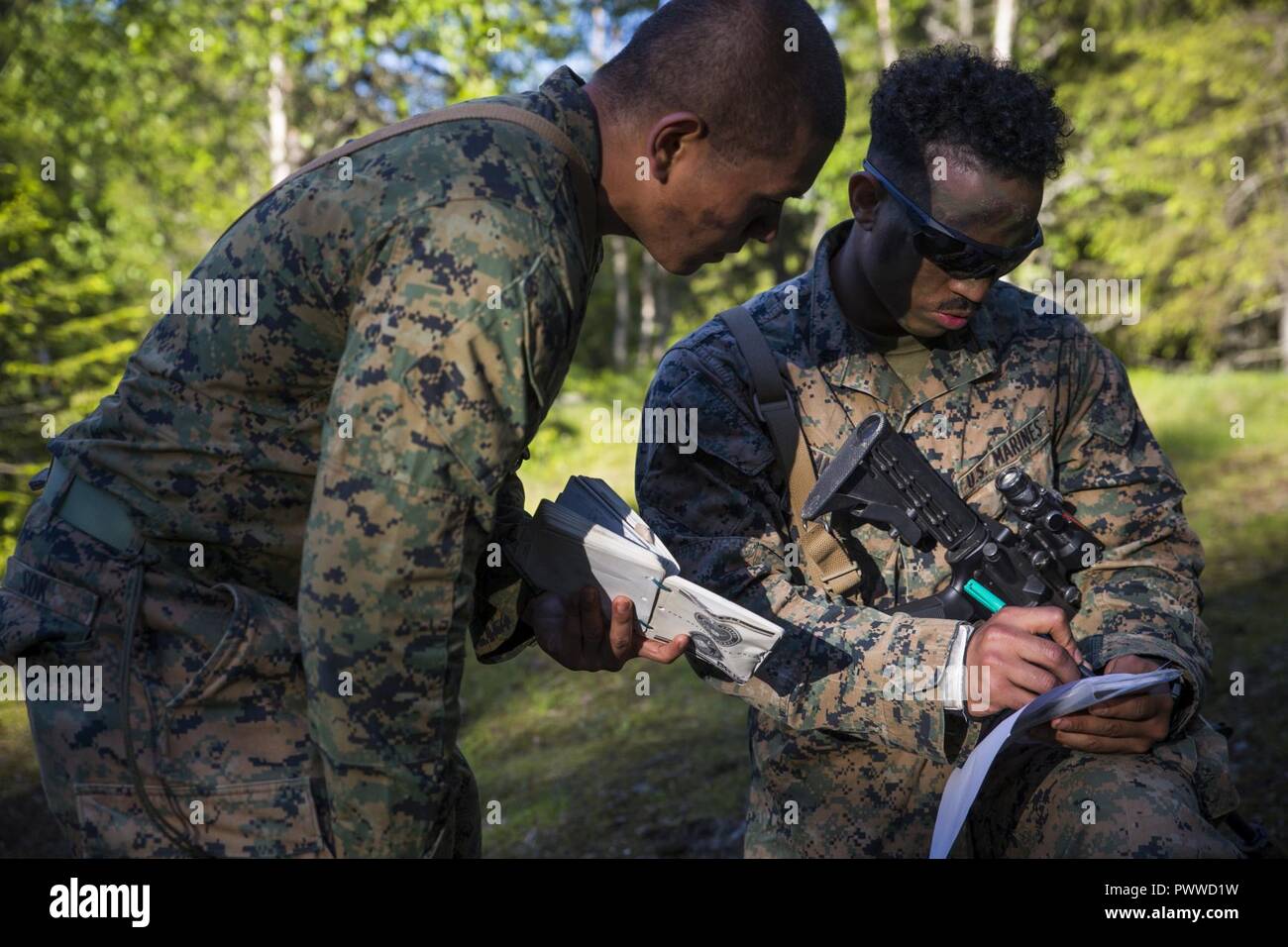 Sgt wandy santos morales and cpl cue sok riflemen with marine