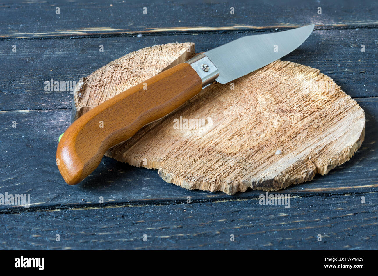 Classic Portuguese knife. Folding knife. Knife with a wooden handle. Stock Photo