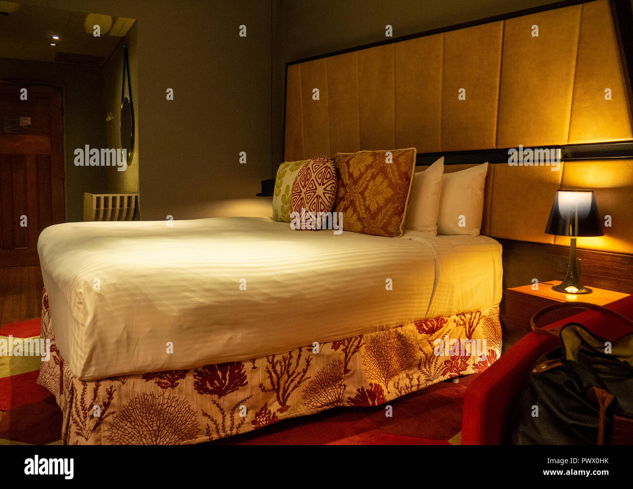 Bed and bedroom in the Gowings Building converted into the QT Hotel, Market Street Sydney NSW Australia. Stock Photo