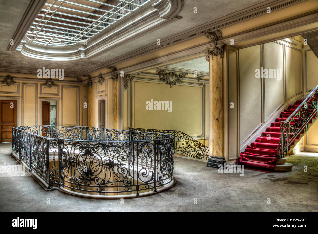 Interior View With Upper Staircase Landing Of An Abandoned