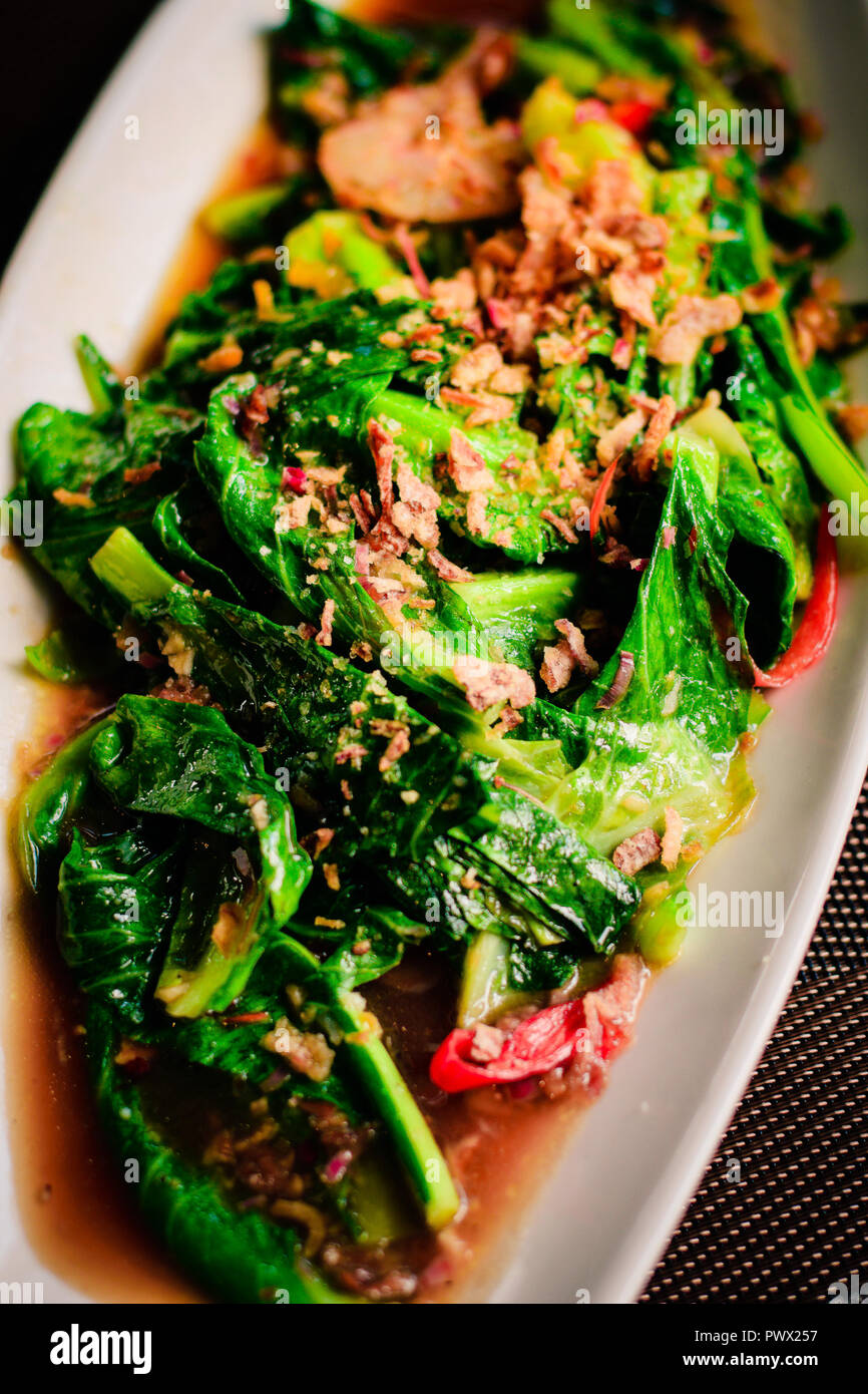 thai Stirfried fresh baby kailan with prawn, garlic and oyster sauce