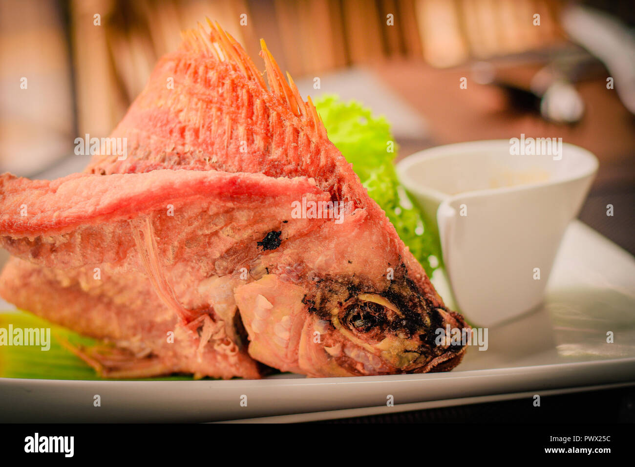 Fried flying fish hi-res stock photography and images - Alamy
