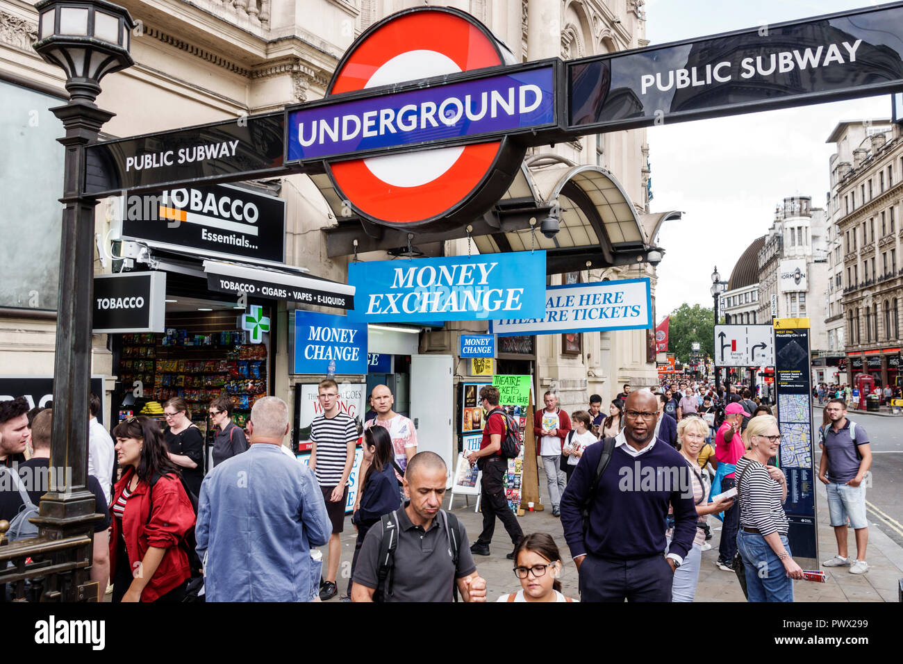 London England,UK West End Piccadilly Circus,St. James's,Underground Station train Tube,subway tube,entrance,outside exterior,roundel,logo,crowded sid Stock Photo