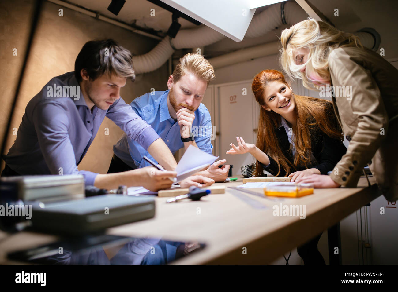 Group of creative designers brainstorming Stock Photo - Alamy