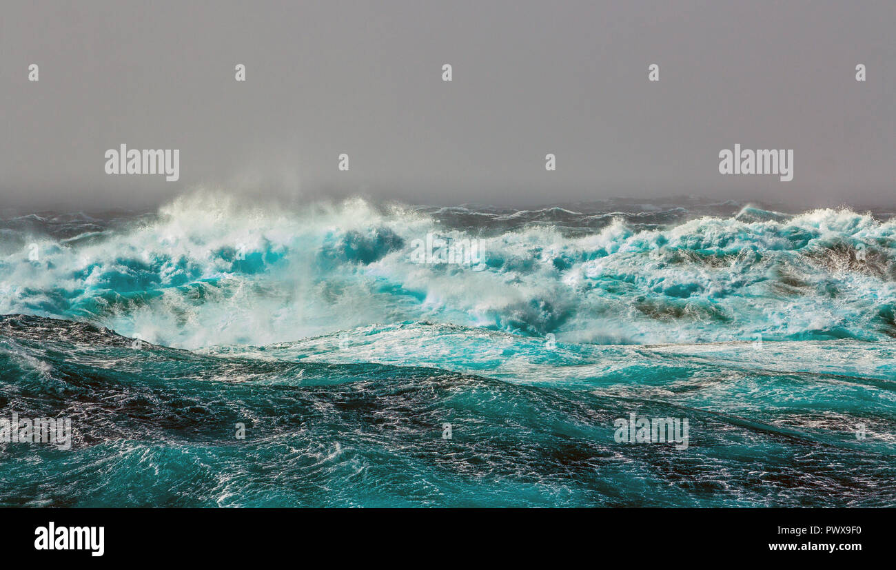 The Southern Arctic Circle. Atlantic Ocean. Storm. Large waves with sharp gusts of wind. Stock Photo