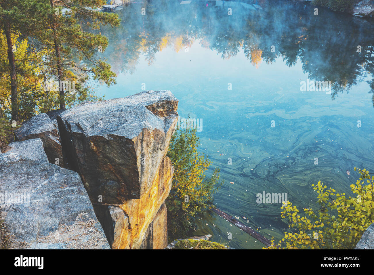 Rocky misty landscape lake hi-res stock photography and images - Alamy