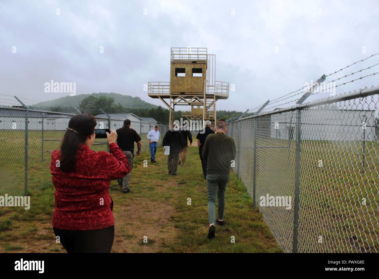 Distinguished visitors (DVs) learn about the Enemy Prisoner of War 2