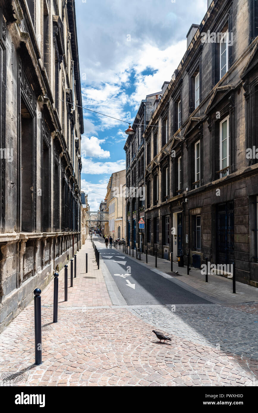Narrow street in historic city centre of Bordeaux, France Stock Photo