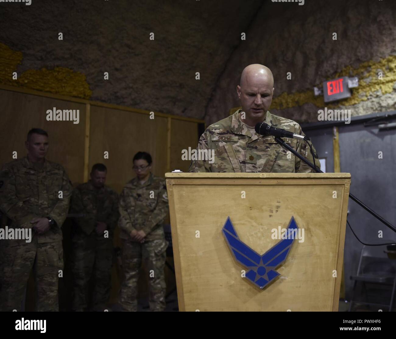 Chaplain (Maj.) Travis Sears, 451st Air Expeditionary Group, delivers an invocation during a ceremony at Kandahar Airfield, Afghanistan, June 23, 2017. Religious support teams from the 455th AEW provide spiritual support in seven locations in Afghanistan. Stock Photo