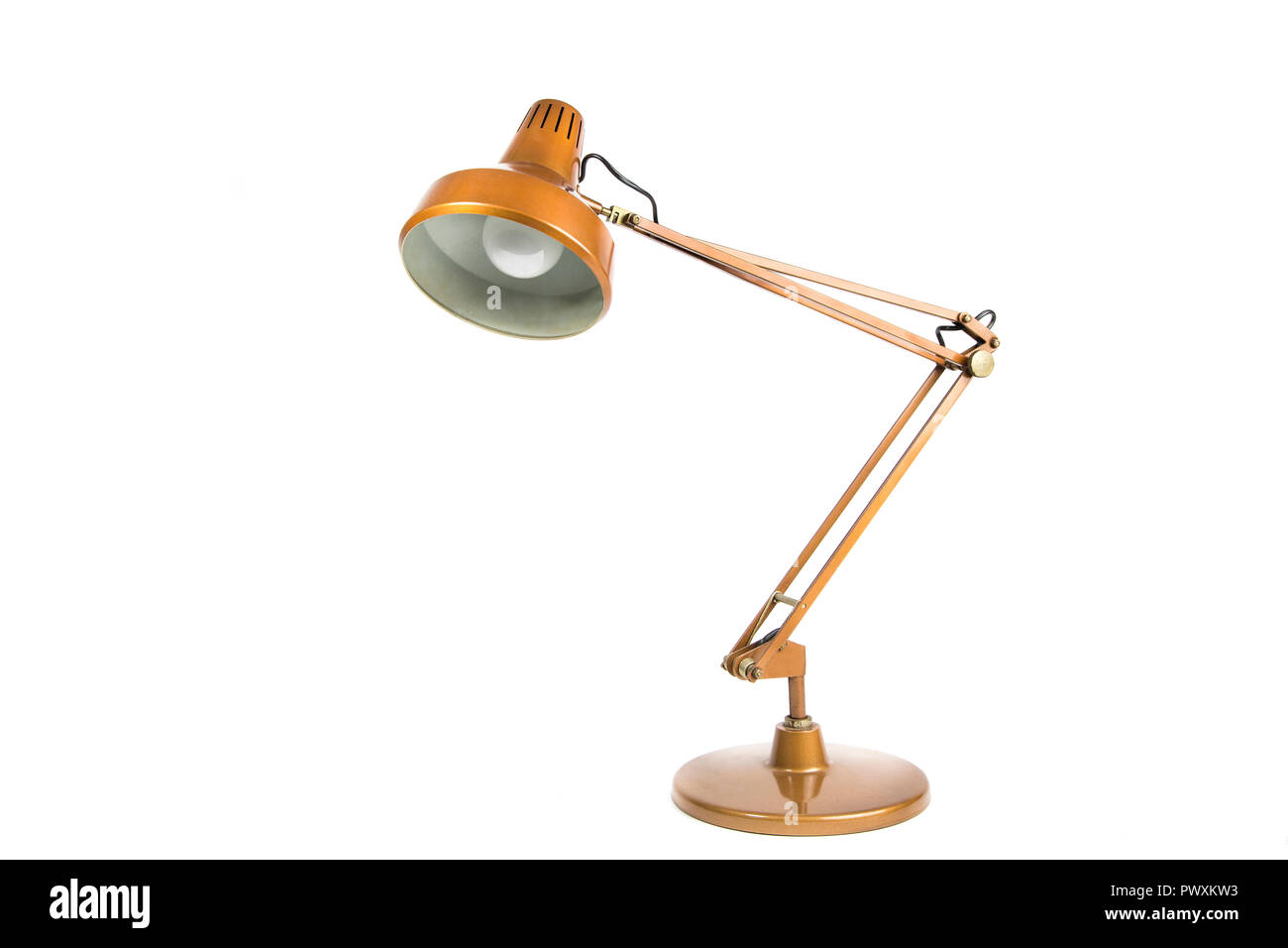 old metallic copper colored table lamp on white background Stock Photo