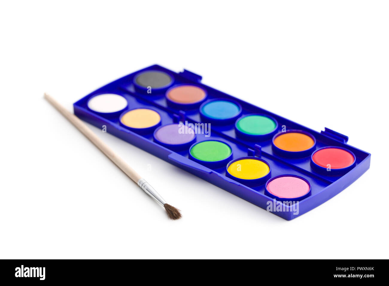 Watercolor pallet with brush isolated on white background. Stock Photo