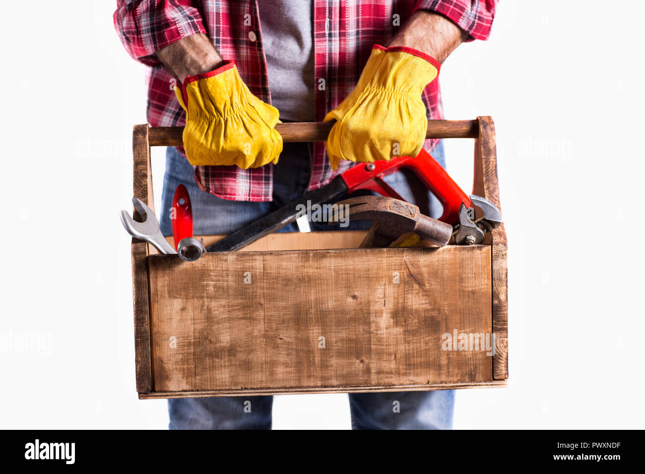 portrait of a handyman with essential tools Stock Photo