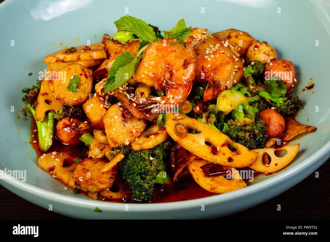 Chinese cuisine ragout with seafood Stock Photo - Alamy