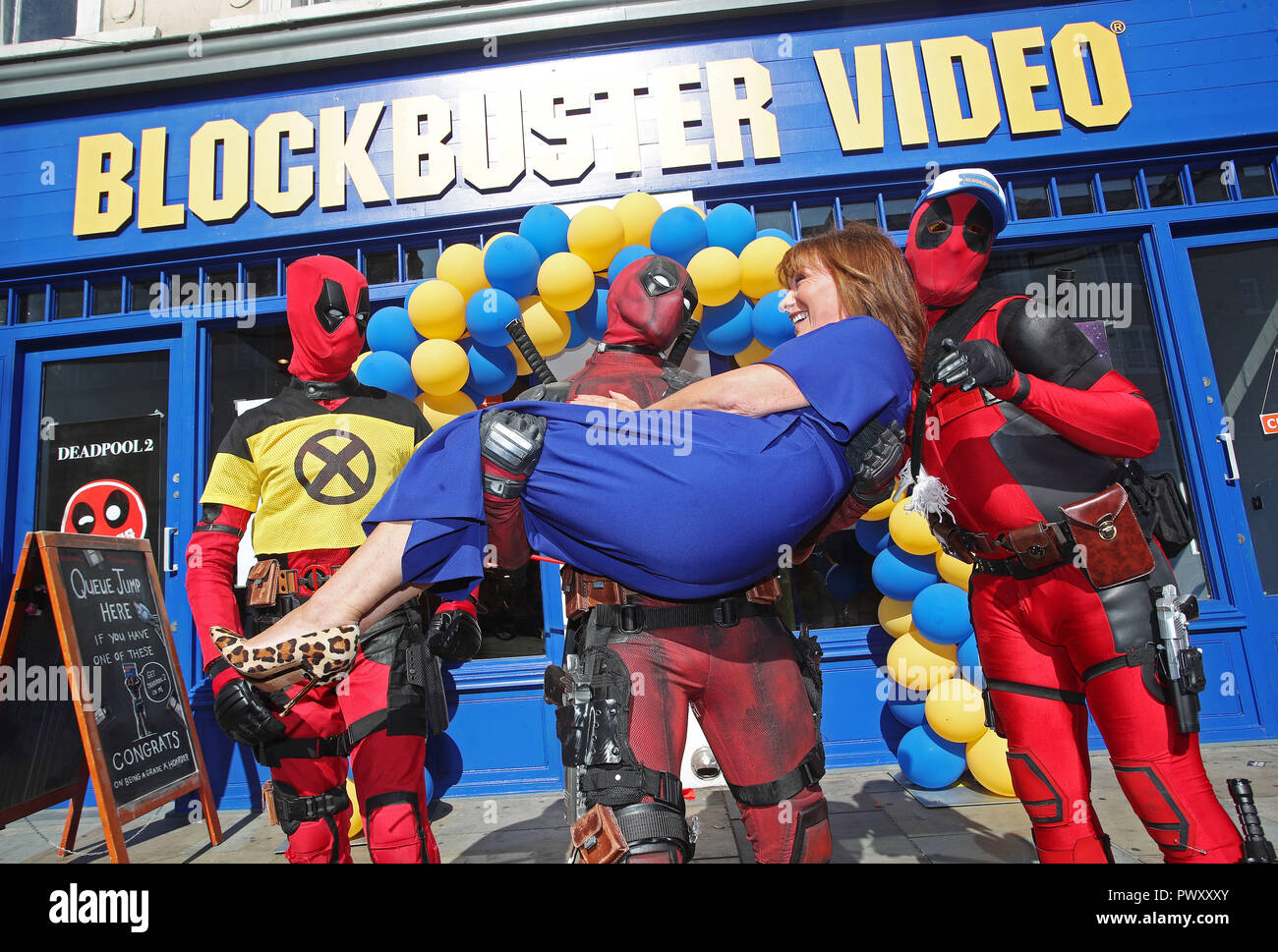 Be Kind Rewind... Deadpool fan Lorraine Kelly and Cosplayer Ryan Payne turn  back the clocks to open a brand new Blockbuster Video pop-up in Shoreditch.  The store has opened up for two