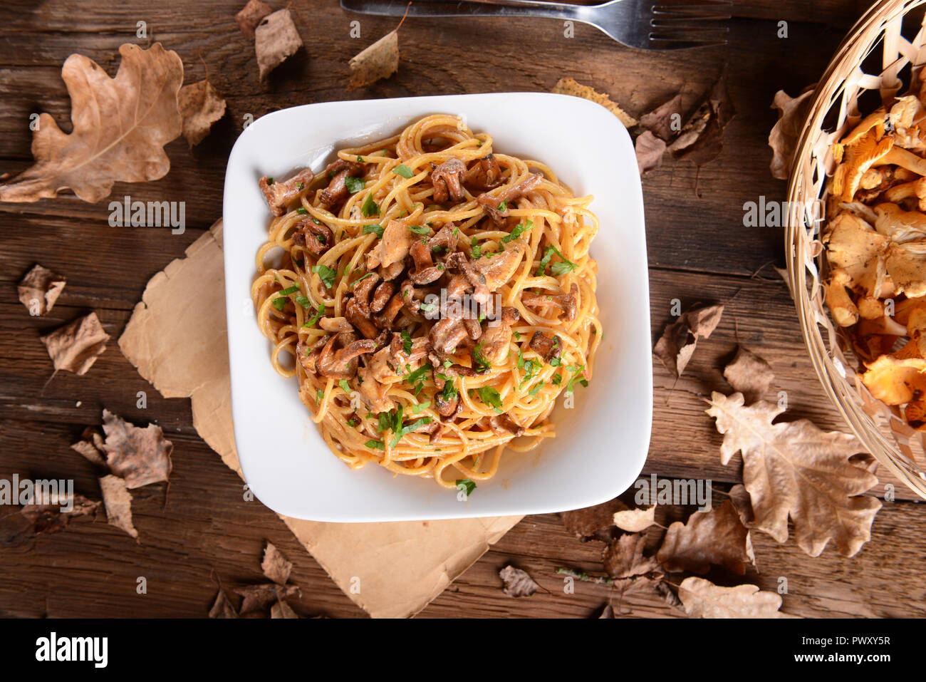 Pasta with chanterelles mushrooms and chicken Stock Photo Alamy