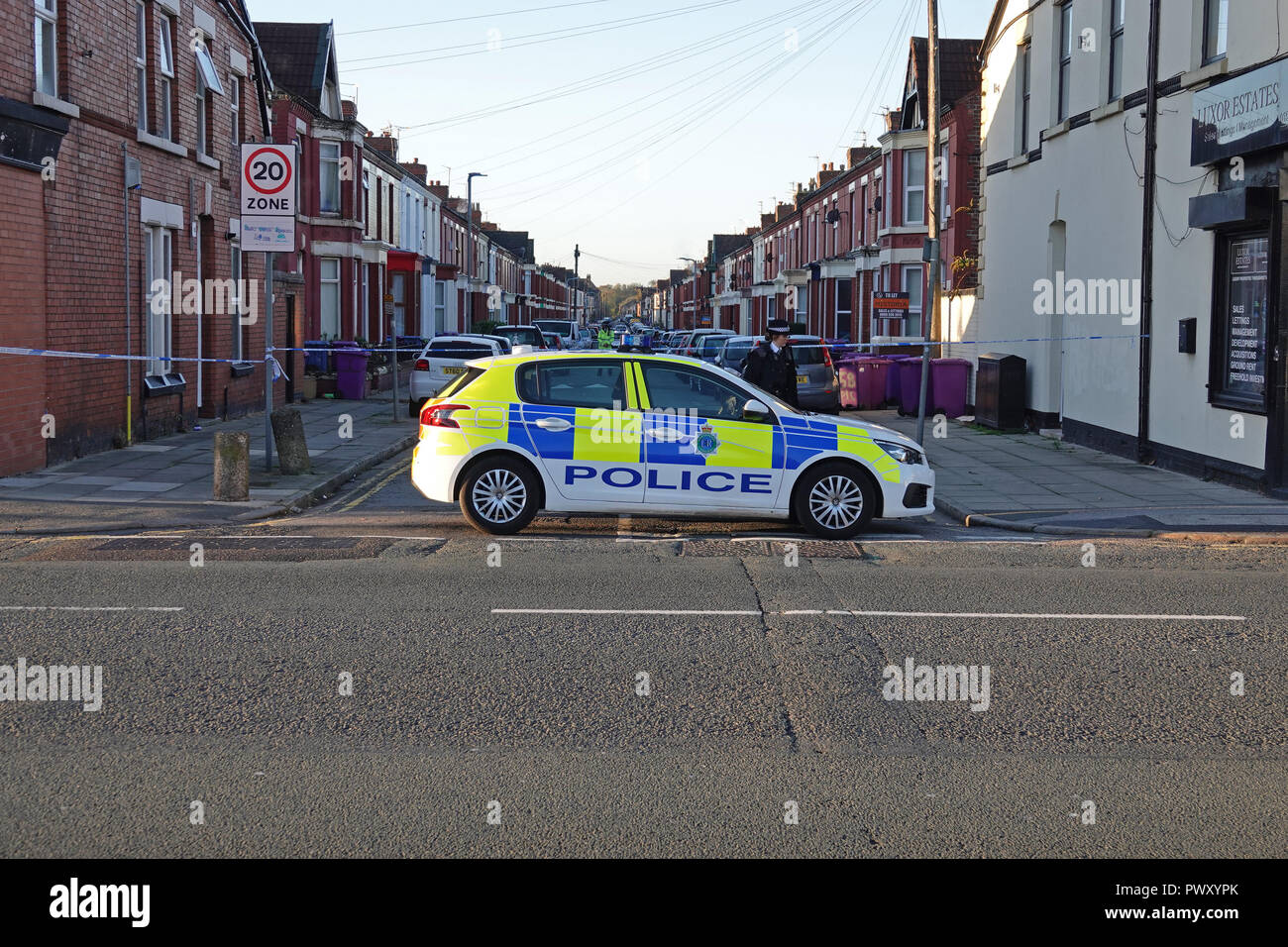 Liverpool, UK. 18th October 2018. A murder investigation is underway after a man was shot multiple times outside a South Liverpool house dies of his injuries. Armed police swooped on Alderson Road, Wavertree, at about 10.40pm on Wednesday night after reports of four shots being fired. Police confirmed a murder probe has been launched after the 25-year-old victim died in hospital during the early hours of Thursday morning. This was the sixth shooting on Merseyside in the last 10 days. Credit: Ken Biggs/Alamy Live News. Stock Photo