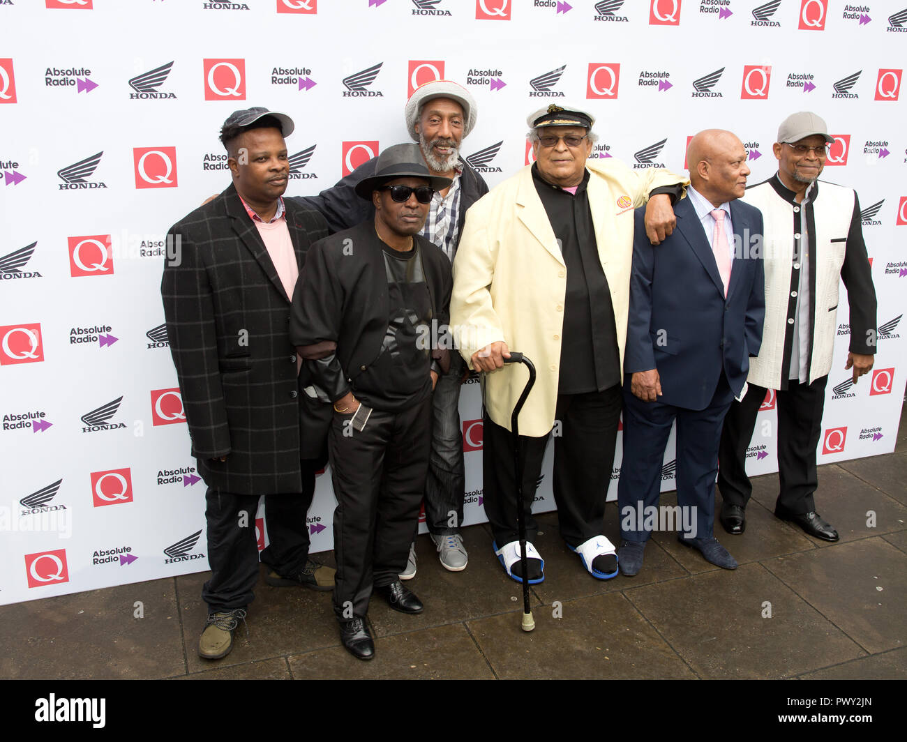 London, UK. 17th Oct 2018. The Round House Chalk Farm  London Uk 17th Oct 2018 Trojan Records arrive at the Q Awards 2018  in Association with Absolute Radio People In Picture: Bunny lee, Dave barker, Locksley Gichie,Chip Richards, Credit: Dean Fardell / Alamy Live News Stock Photo