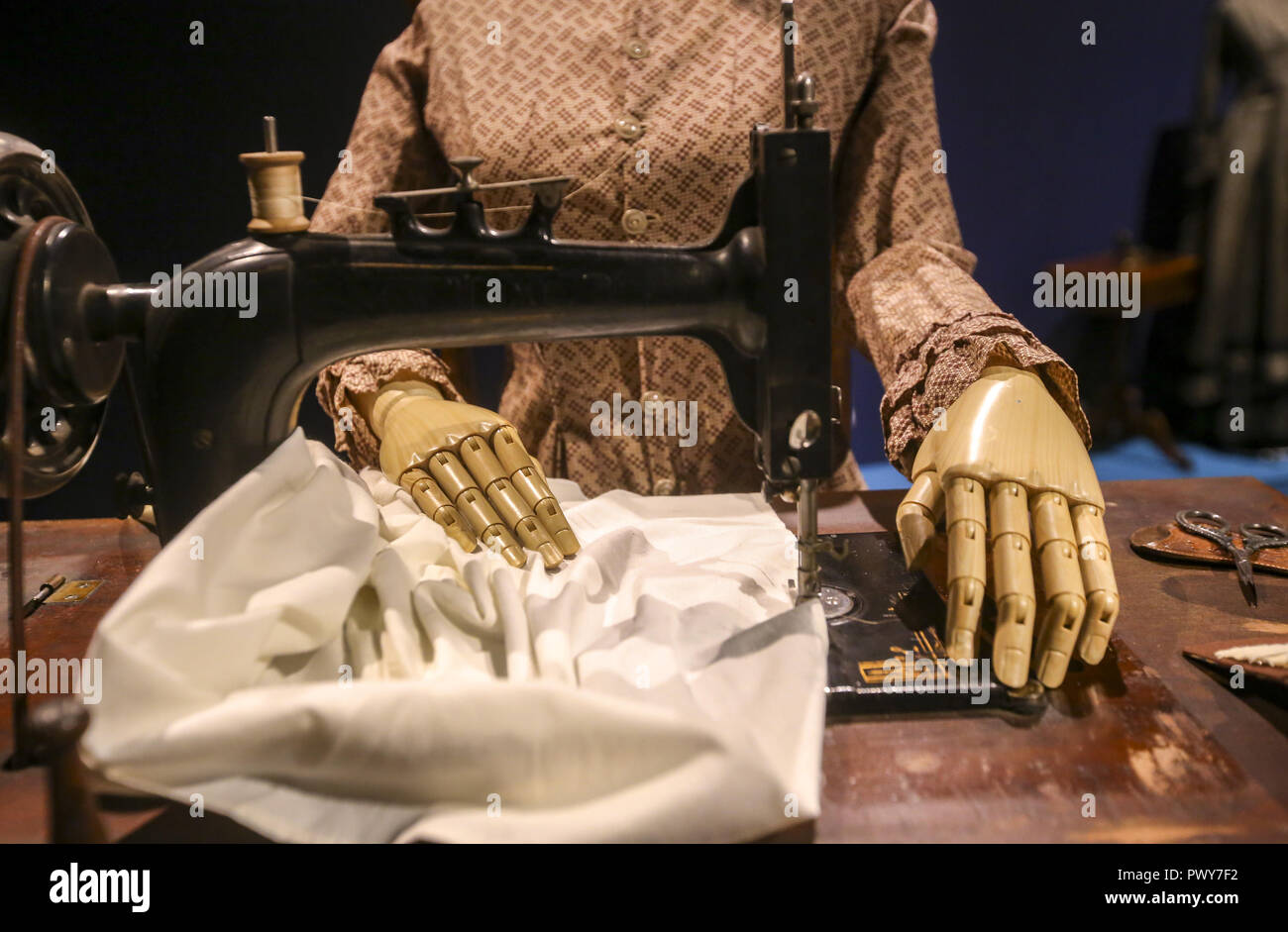 Davenport, Iowa, USA. 5th Oct, 2018. Laura Ingalls sews a bed sheet in the ''Little House on the Prairie'' display in the ''Literary Heroines'' exhibit at the Putnam Museum in Davenport on Friday, Oct. 5, 2018. Credit: Andy Abeyta, Quad-City Times/Quad-City Times/ZUMA Wire/Alamy Live News Stock Photo