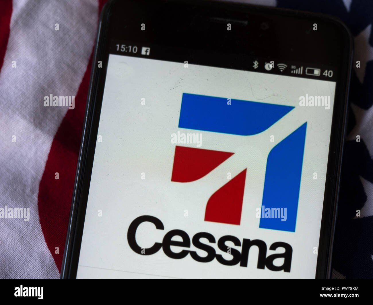 Cessna logo seen displayed on smart phone. Cessna Aircraft Company was an  American general aviation aircraft manufacturing corporation. Best known  for small, piston-powered aircraft, Cessna also produced business jets  Stock Photo - Alamy, image size:1300x1065