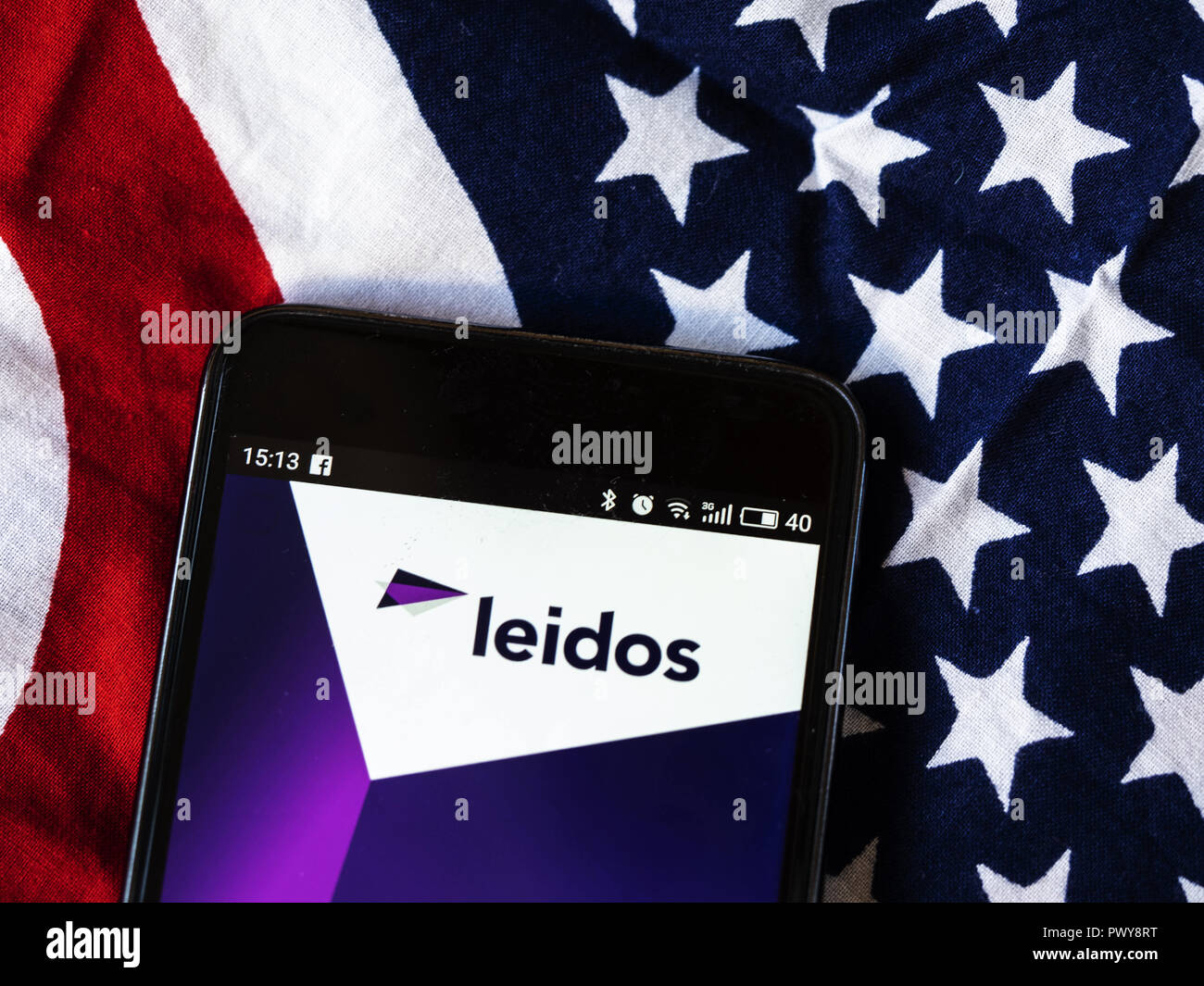 Kiev, Ukraine. 18th Oct, 2018. Leidos Scientific research company logo seen displayed on smart phone. Leidos, formerly known as Science Applications International Corporation, is an American defense, aviation, information technology, and biomedical research company, that provides scientific, engineering, systems integration, and technical services. Credit: Igor Golovniov/SOPA Images/ZUMA Wire/Alamy Live News Stock Photo