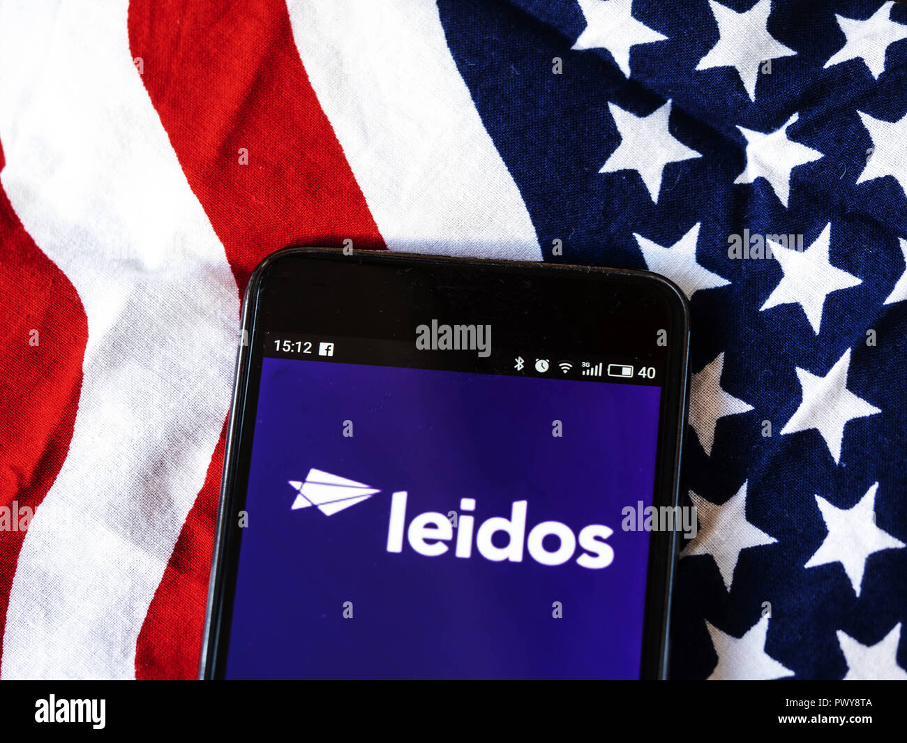 Kiev, Ukraine. 18th Oct, 2018. Leidos Scientific research company logo seen displayed on smart phone. Leidos, formerly known as Science Applications International Corporation, is an American defense, aviation, information technology, and biomedical research company, that provides scientific, engineering, systems integration, and technical services. Credit: Igor Golovniov/SOPA Images/ZUMA Wire/Alamy Live News Stock Photo