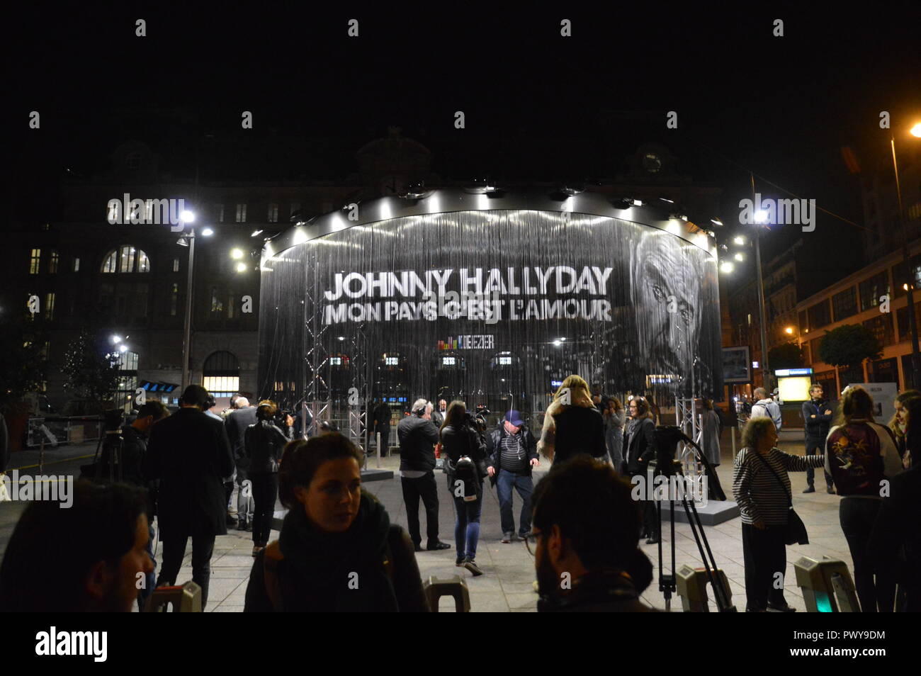 Paris, France. 19th October, 2018. Warner Bros Music France releases at midnight the posthumous album of Jean-Philippe Smet alias Johnny Hallyday 'Mon pays c'est l'amour' (my country is love). StoresÂ (as the Fnac of the Champs-Elysees) opensÂ especially by night for fans, bikers or not. Deezer permits that the album can be listened outside the train station Gare Saint-Lazare. Night of 18 to 19 october 2018.  ALPHACIT NEWIM / Alamy Live News Stock Photo