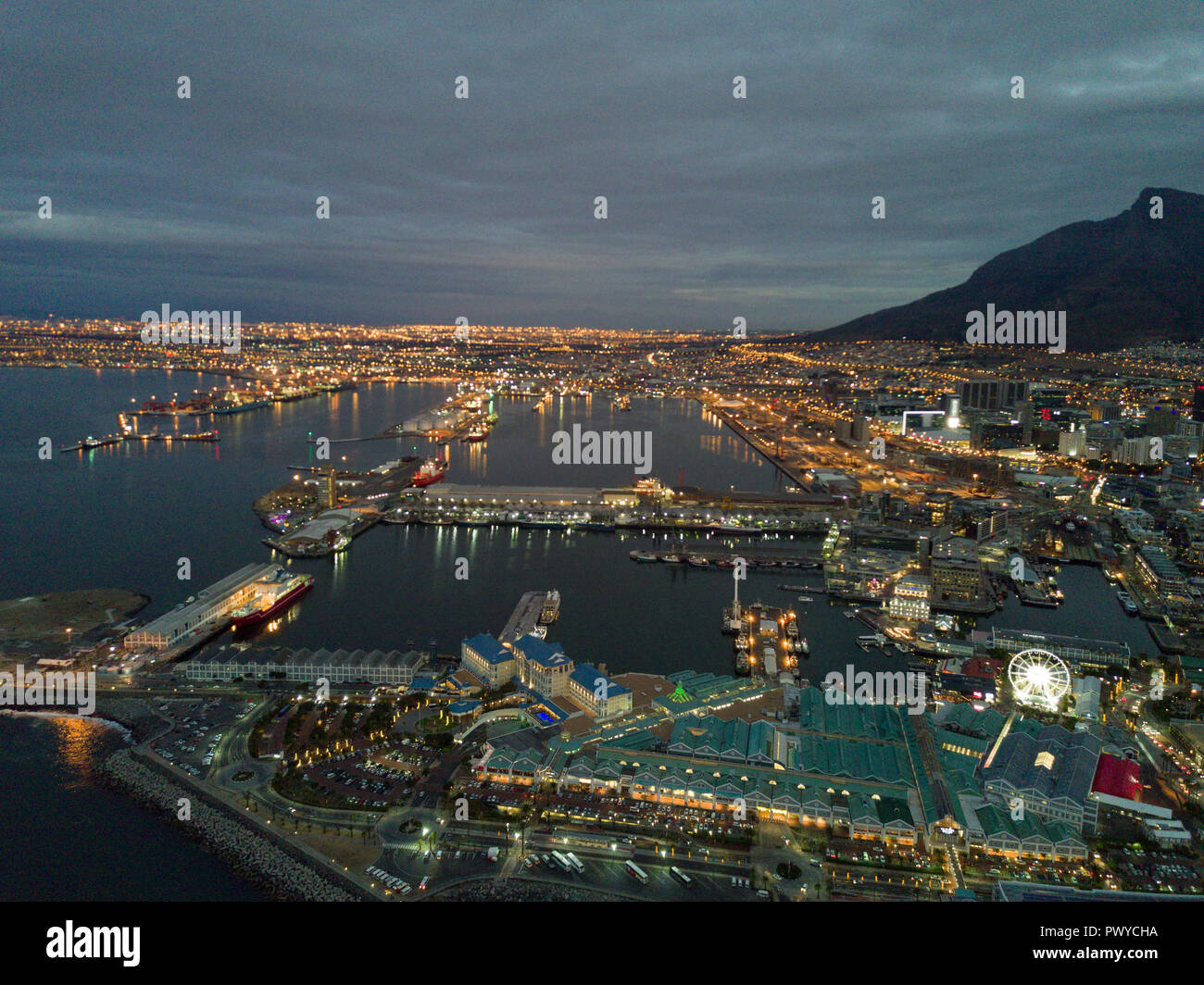 Cape Town and coast line, jetty. Are ships and boats, far mountain on