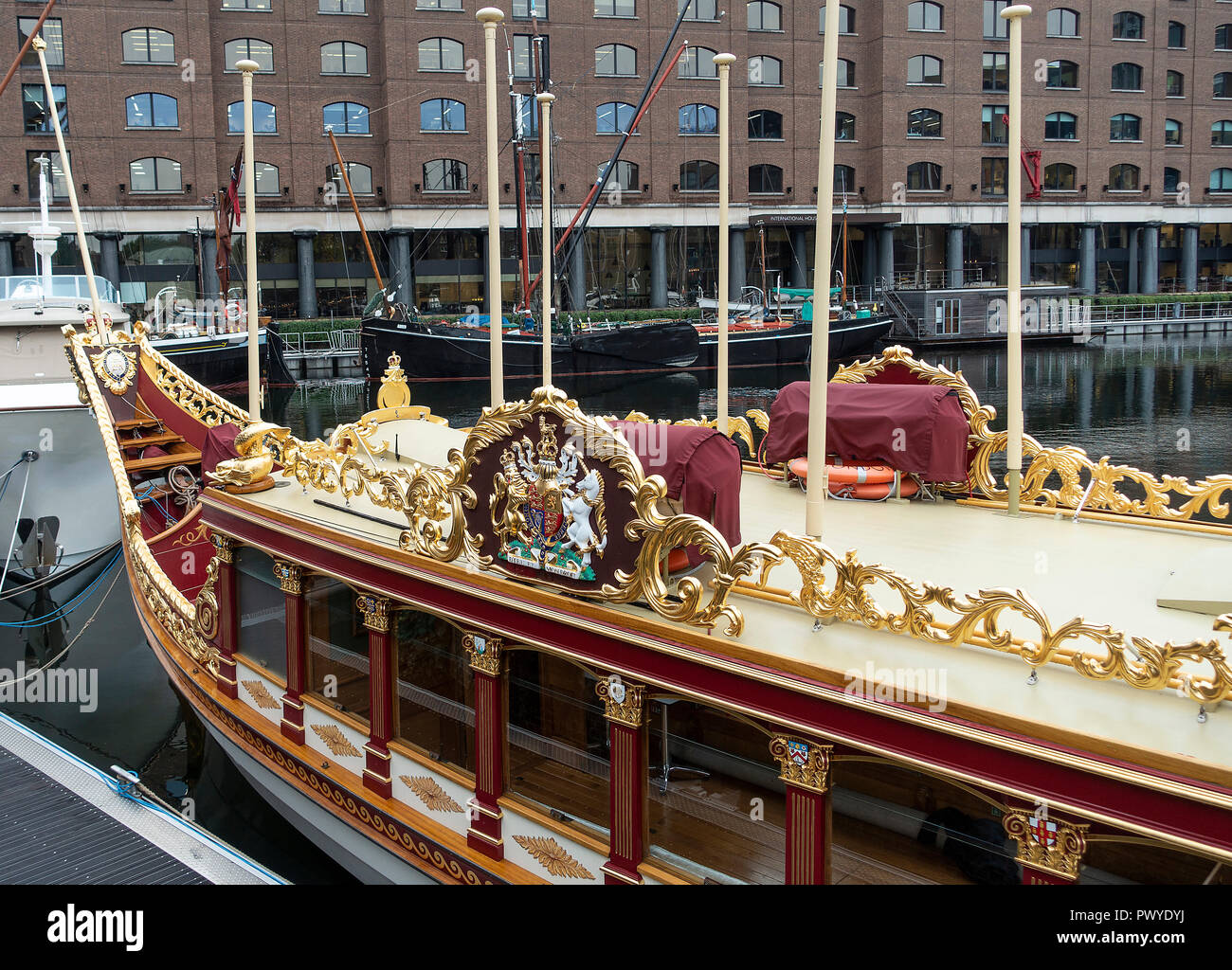 The Royal Barge Gloriana Moored in St Katharine Docks by the River Thames near Tower Bridge in Tower Hamlets London England United Kingdom UK Stock Photo