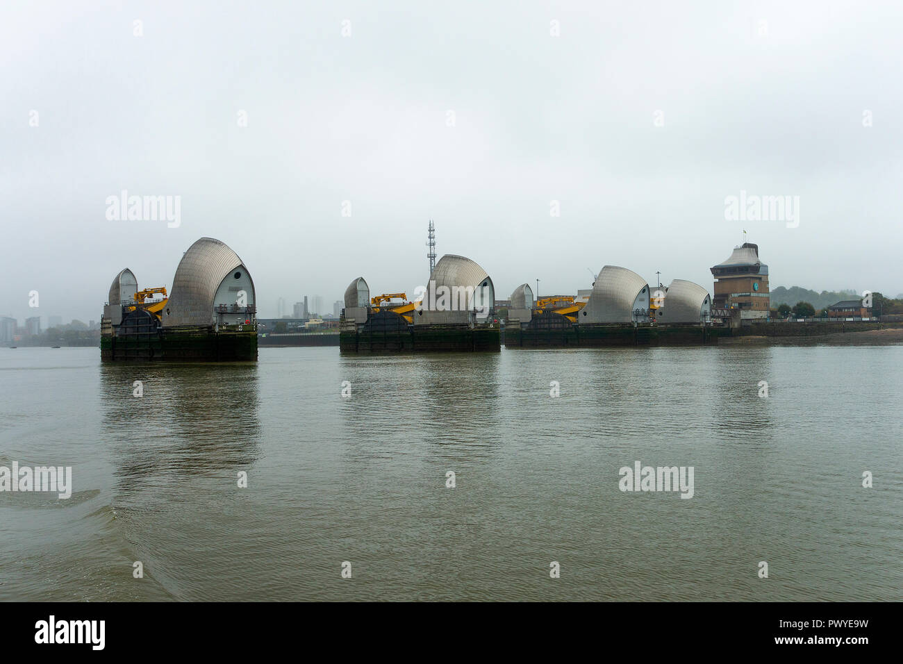 The Thames Barrier Flood Defences in the River Thames near Greenwich and Silvertown Greater London England United Kingdom Stock Photo