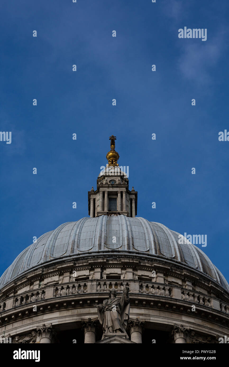 London, UK. Close up of the dome of St Paul's Cathedral against bright blue sky. Stock Photo
