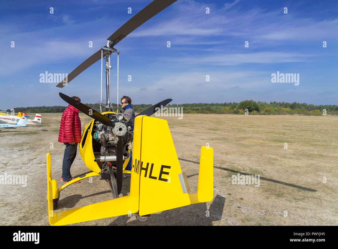 Gifhorn, Germany, September 16, 2018: gyrocopter before take-off with the next passenger. Stock Photo