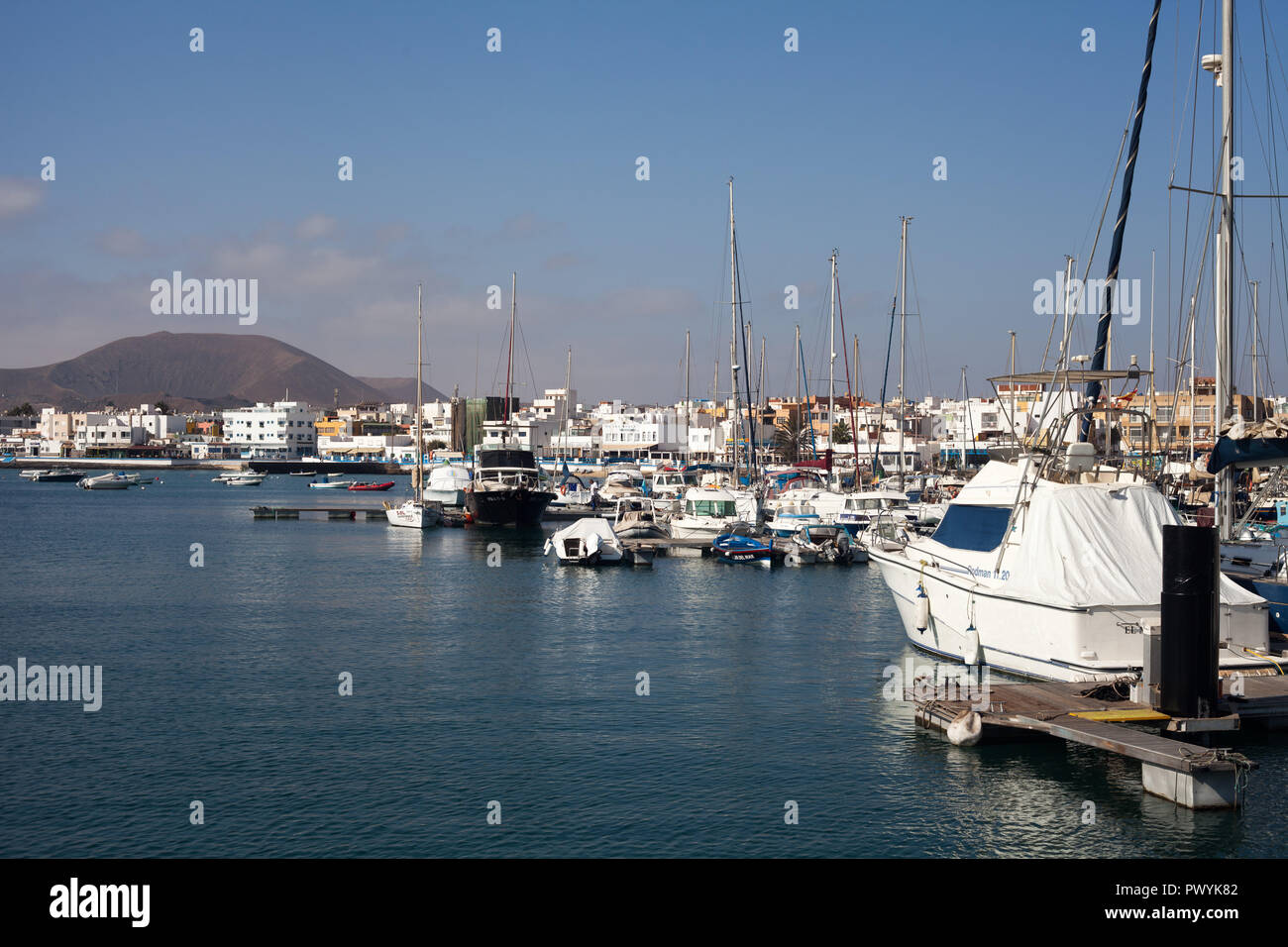 Corralejo's harbour ,with Los Lobos island in the distance Canary Islands, Spain Stock Photo