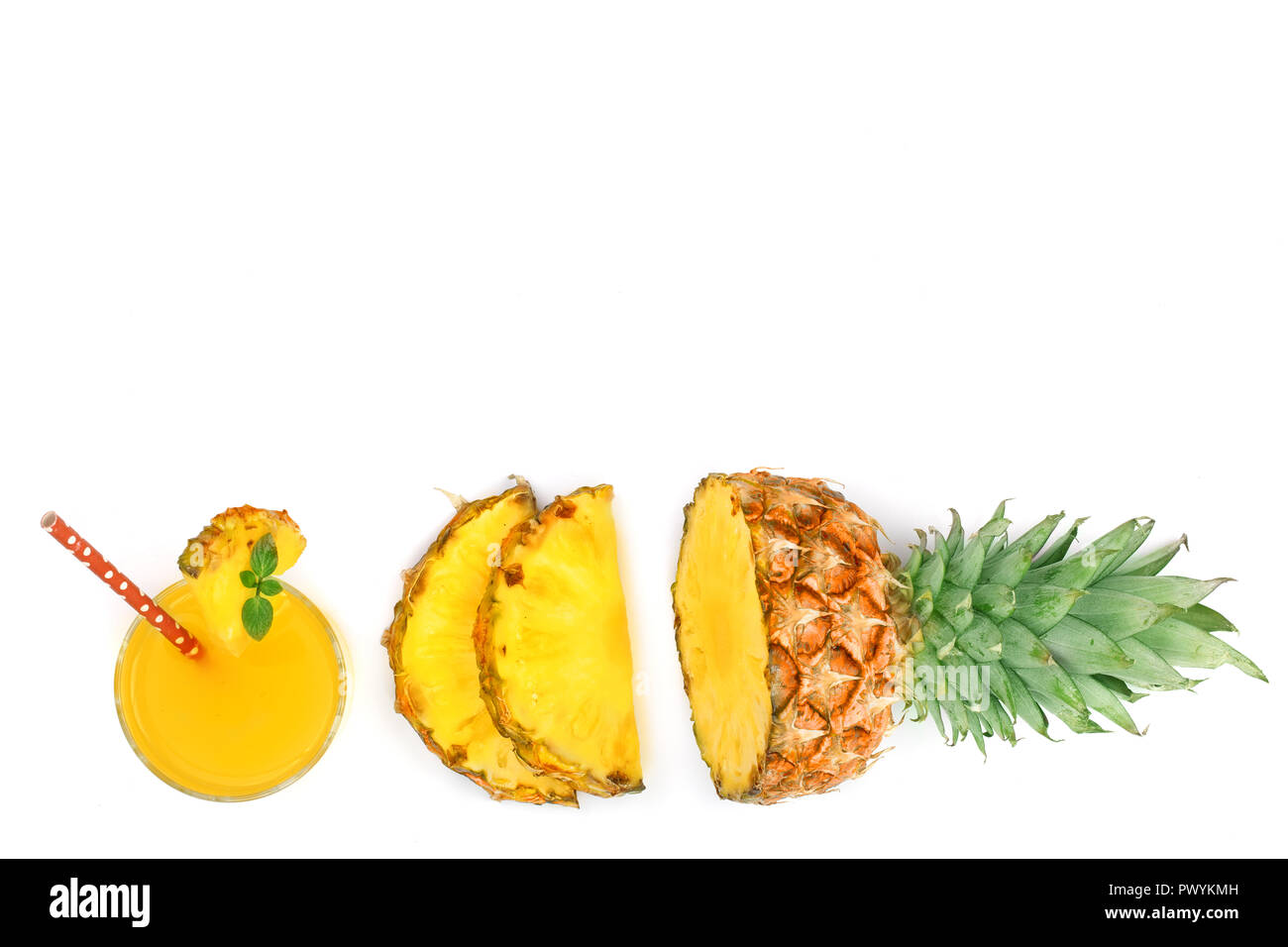 pineapple juice in a glass and pineapple slices isolated on white ...