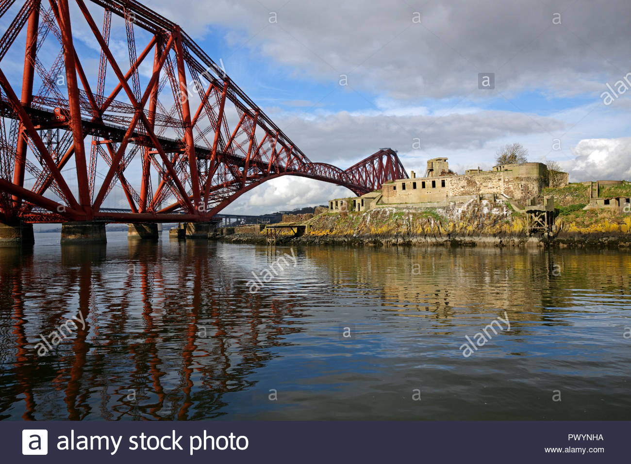View of Inchgarvie and the Forth Bridge, a small uninhabited island in the Firth of Forth, near North Queensferry, Scotland Stock Photo