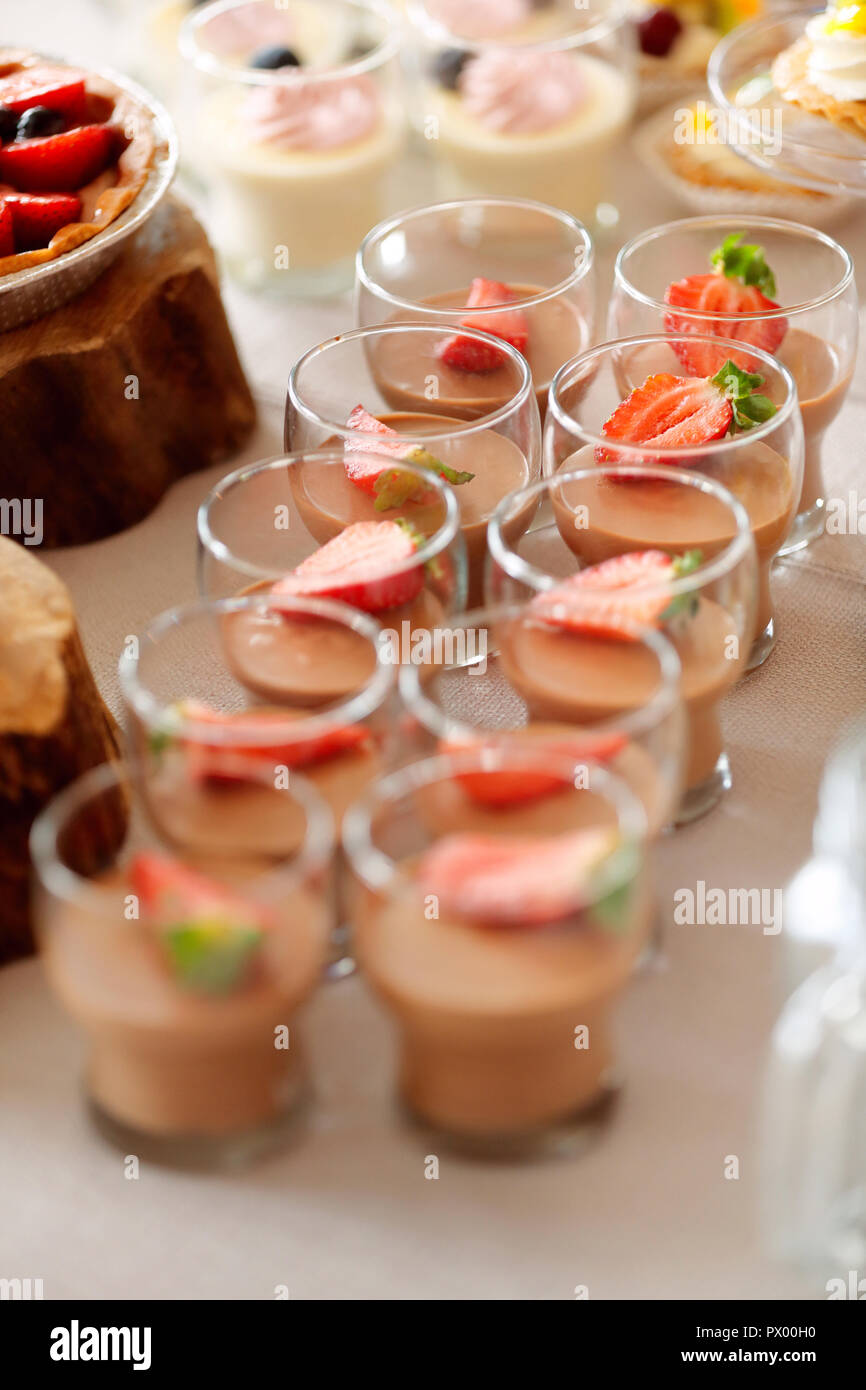 Catering sweets, closeup of various kinds of fruit pastry on event or wedding reception Stock Photo
