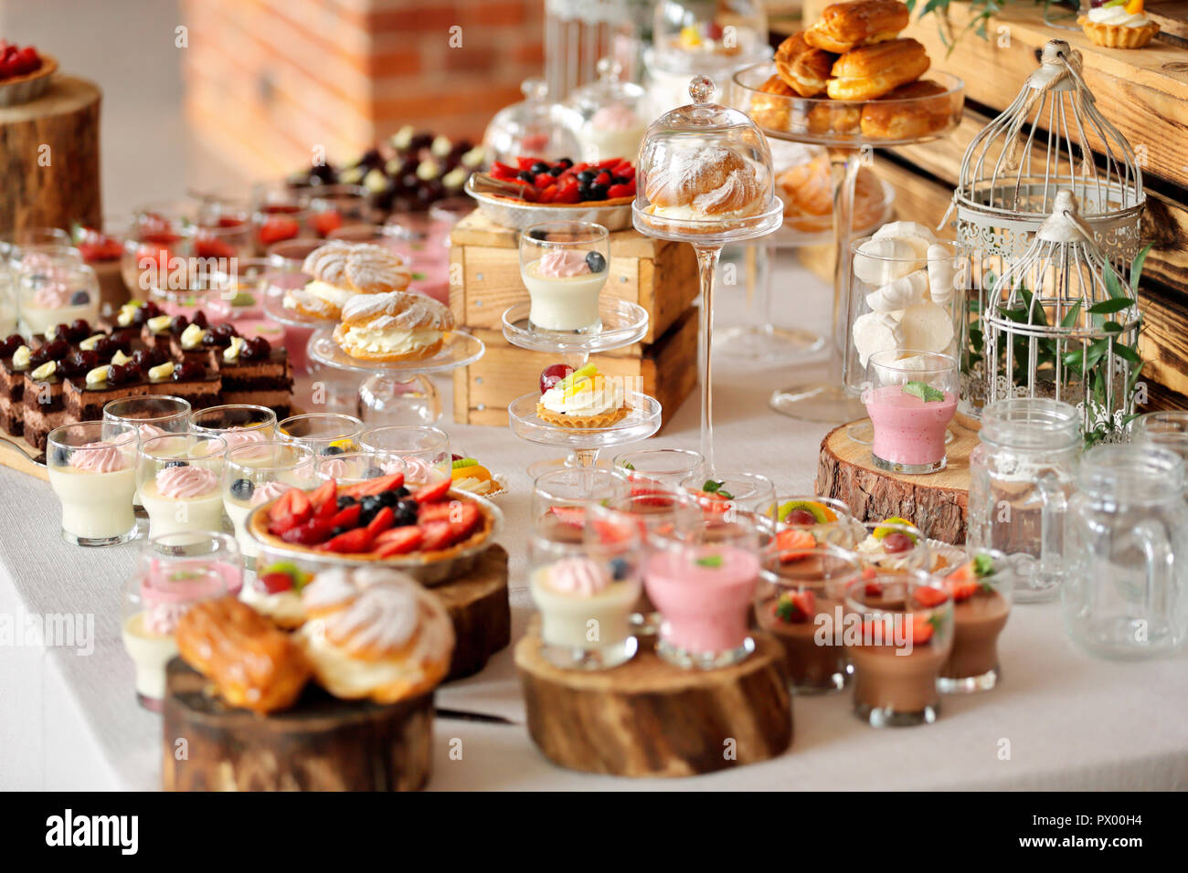 Catering sweets, closeup of various kinds of fruit pastry on event or wedding reception Stock Photo