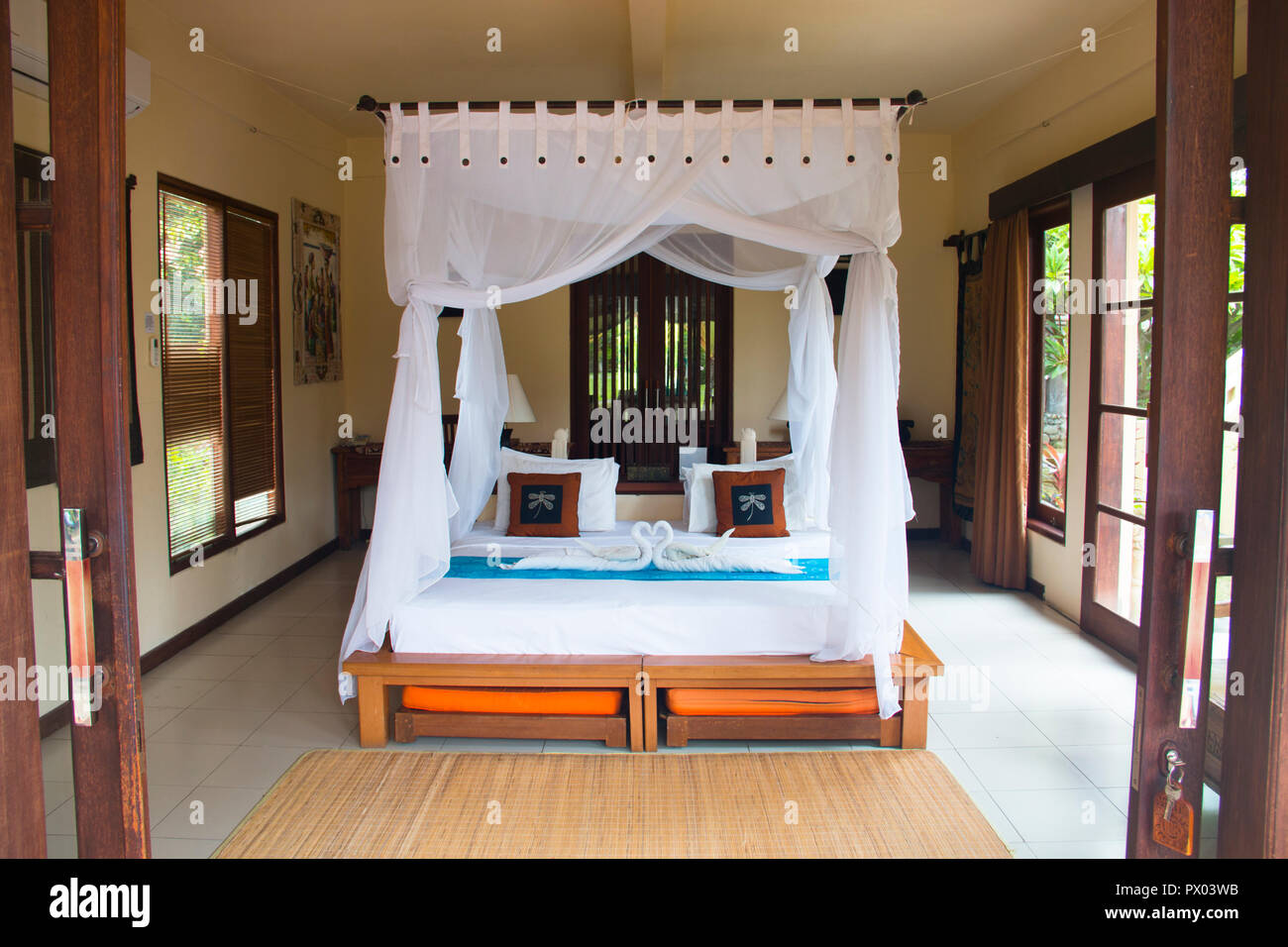 Fancy Hotel Room With Towels Folded Like Swans In Pemuteran