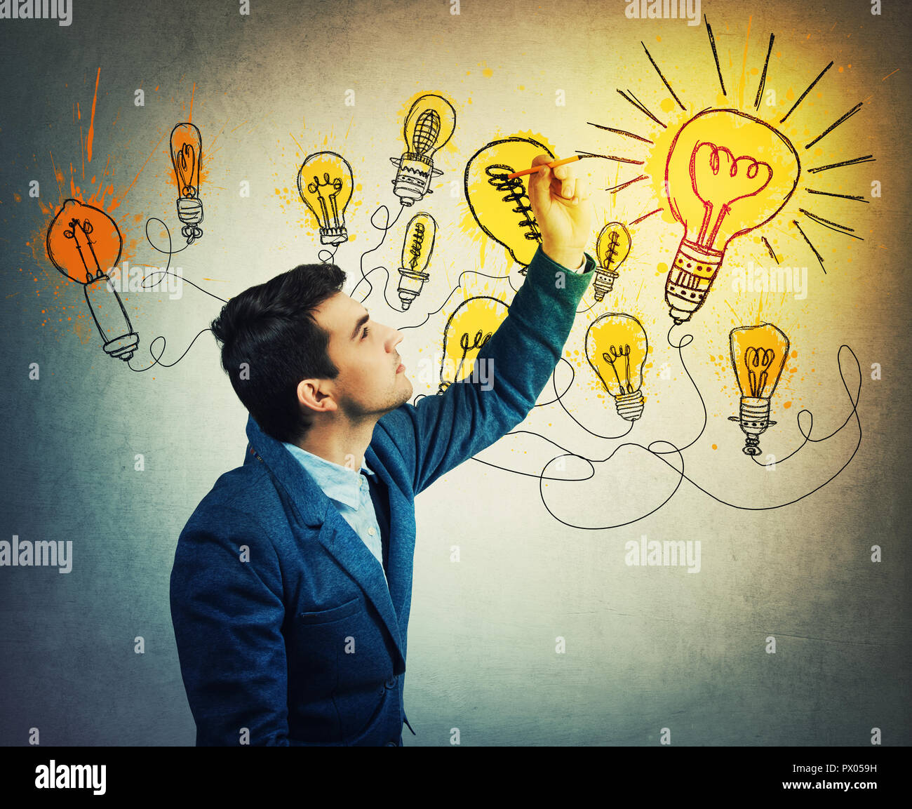 Thoughtful businessman drawing imaginative shining light bulbs. Different business thinking, genius creativity concept, alternative idea as the way to Stock Photo
