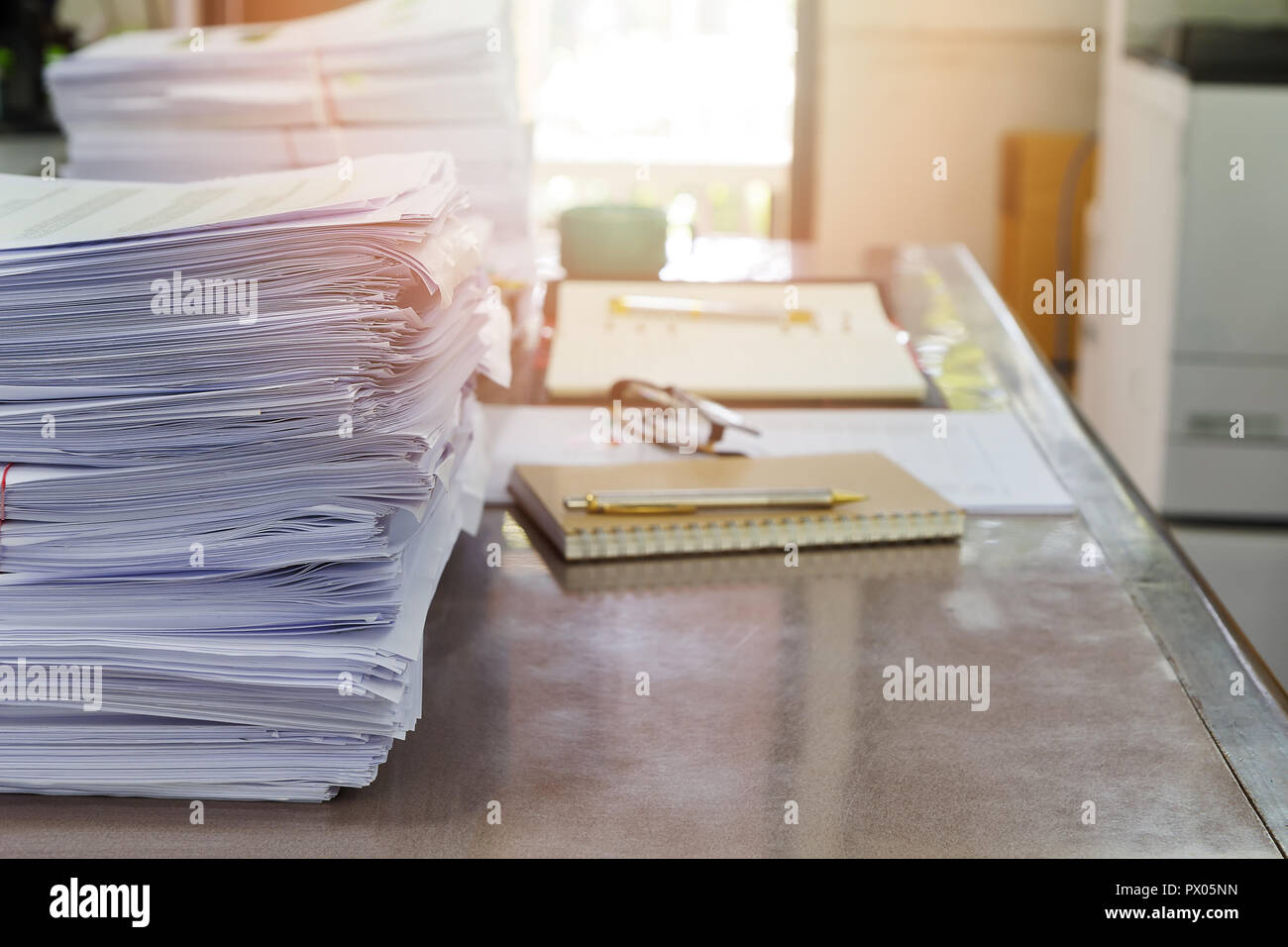 Close up of business documents stack on desk , report papers stack