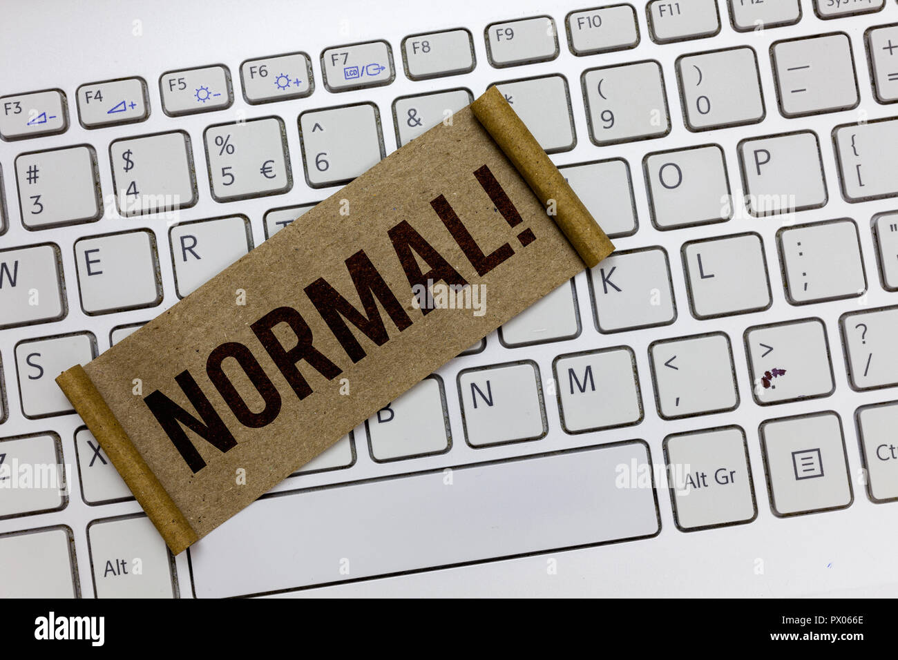 Handwriting text writing Normal. Concept meaning Conforming to a