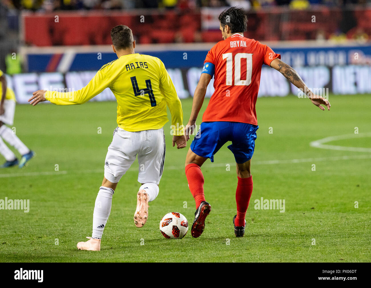 Harrison, NJ - October 16, 2018: Santiago Arias (4) of Colombia & Brian Ruiz (10) of Costa Rica fight for ball during the friendly soccer game between Costa Rica & Colombia at Red Bull Arena Colombia won 3 - 1 Stock Photo