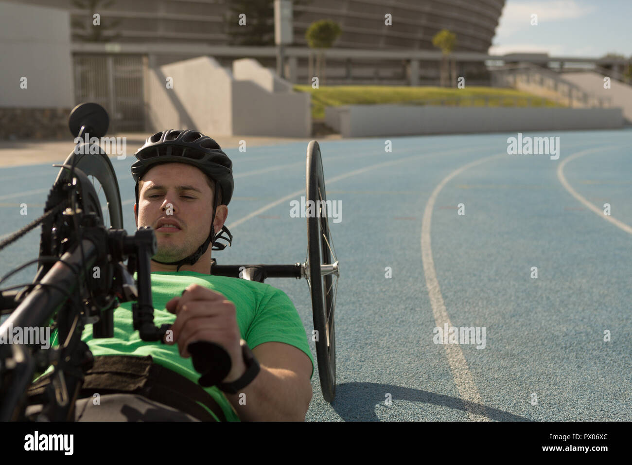 Disabled athlete racing in wheelchair Stock Photo Alamy
